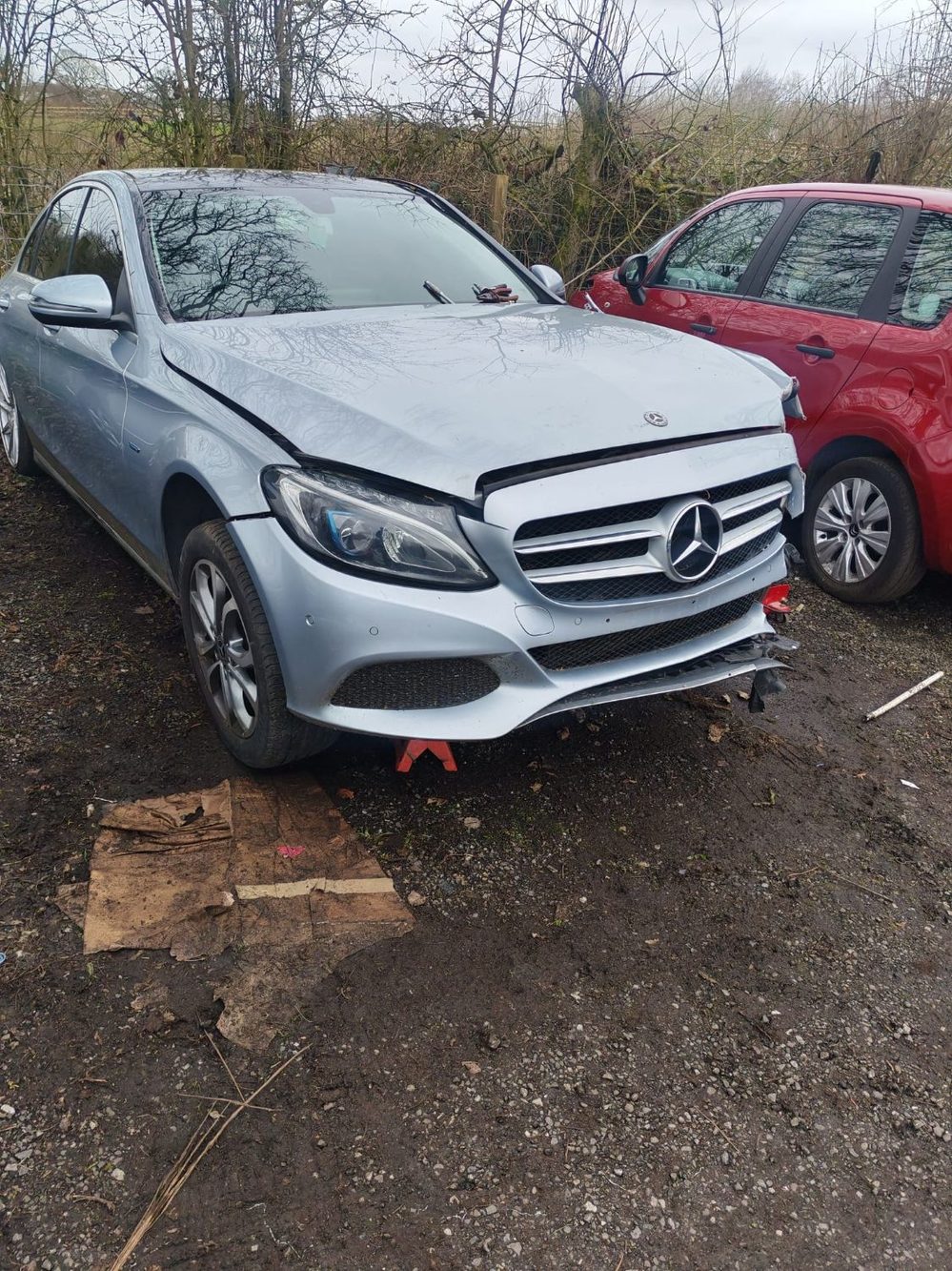 Mercedes-Benz C-Class with severe nearside front collision damage before repair at Wiluc Motors